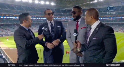 a group of men in suits are on a fox sports channel