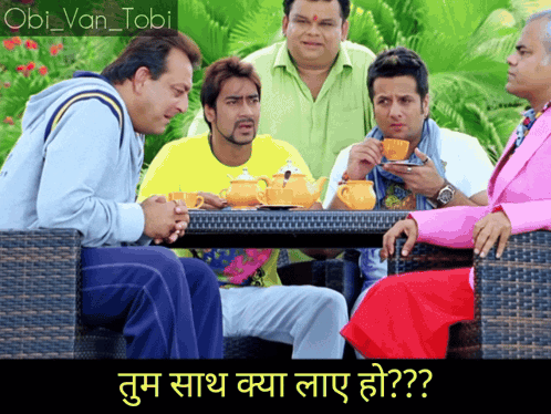 A Group Of Men Sitting Around A Table With A Caption In A Foreign Language That Says " Obil Van Tobi " GIF