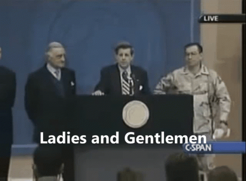 A Group Of Men Standing Behind A Podium With The Words Ladies And Gentlemen On The Screen GIF