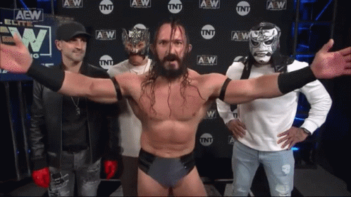 A Group Of Men Standing In Front Of A Wall That Says Aew On It GIF