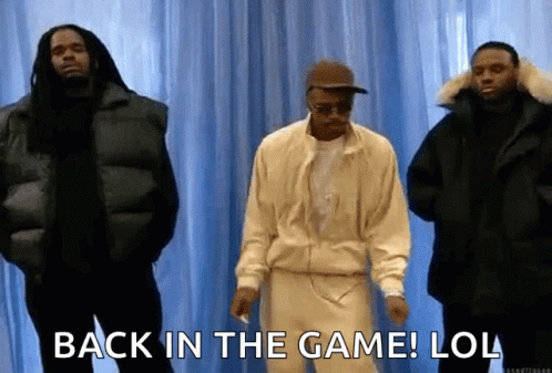 A Group Of Men Standing Next To Each Other With The Words `` Back In The Game ! Lol '' . GIF