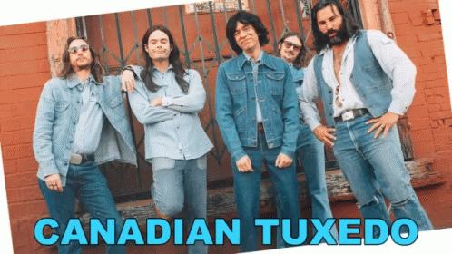 A Group Of Men Standing Next To Each Other With The Words Canadian Tuxedo Written Below Them GIF