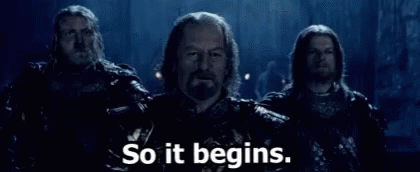 A Group Of Men Standing Next To Each Other With The Words `` So It Begins . '' GIF