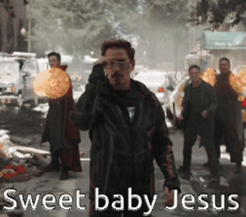 A Group Of Men Standing On A Street With The Words Sweet Baby Jesus Written On The Bottom GIF