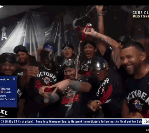 A Group Of Men Wearing October Shirts Are Standing Together GIF