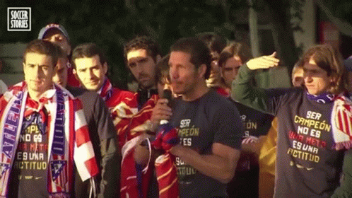 A Group Of Men Wearing Shirts That Say Ser Campeon No Es Buena Actitud GIF