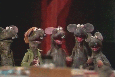 A Group Of Mice Standing Next To Each Other With Their Mouths Open GIF