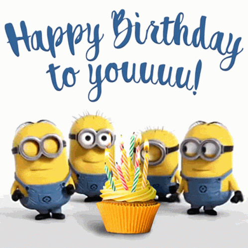 A Group Of Minions Standing Around A Cupcake With Candles And The Words Happy Birthday To Youuuu GIF