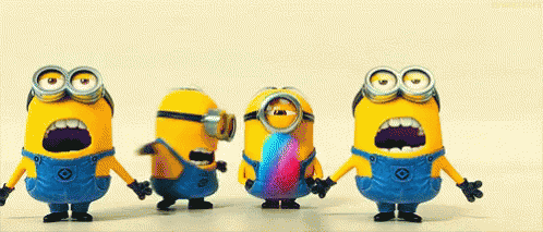 A Group Of Minions Standing Next To Each Other With Their Mouths Open . GIF