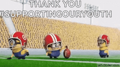 A Group Of Minions Wearing Football Helmets Are Running On A Field With A Football . GIF