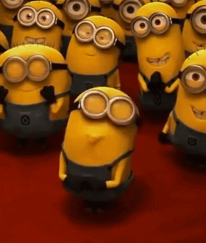 Minions In Goggles And Overalls On Red Carpet GIF