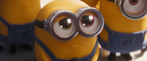 A Group Of Minions Wearing Goggles Are Looking At The Camera GIF