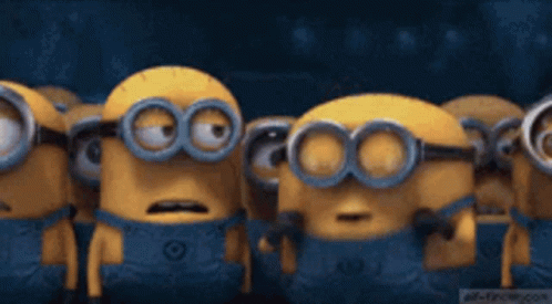 A Group Of Minions Wearing Goggles Are Standing In A Row GIF
