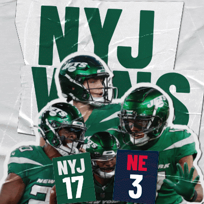 A Group Of Ny Jets Players Are Holding Up Signs GIF
