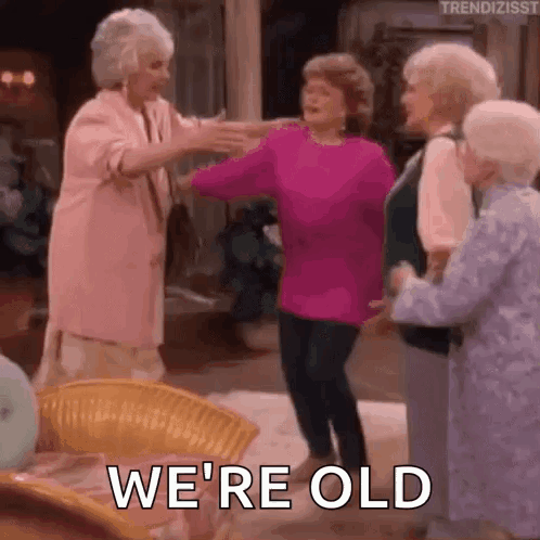 A Group Of Older Women Are Dancing Together In A Living Room While A Woman Says `` We 'Re Old '' . GIF