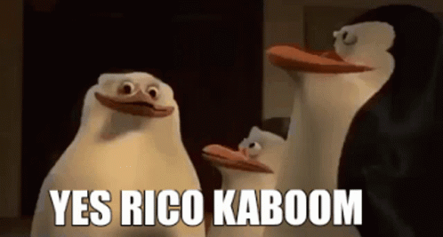 A Group Of Penguins From Madagascar Are Standing Next To Each Other And Talking . GIF