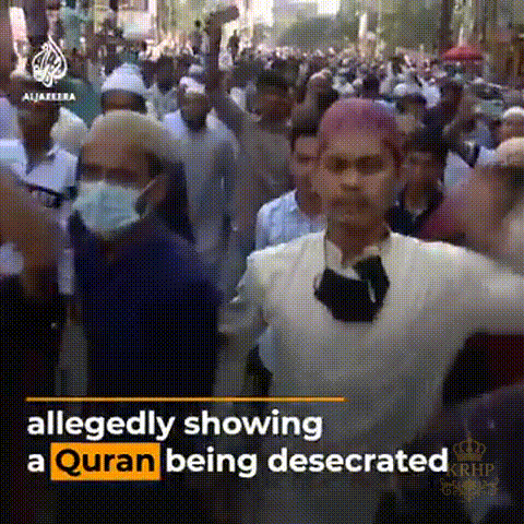 a group of people are allegedly showing a quran being desecated