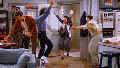A Group Of People Are Dancing In A Living Room In A Living Room . GIF