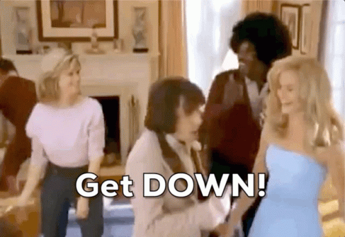 A Group Of People Are Dancing In A Living Room With The Words Get Down Written On The Screen GIF