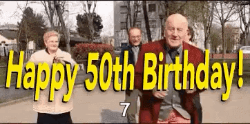 A Group Of People Are Dancing In A Park With The Words `` Happy 50Th Birthday '' Written Above Them . GIF