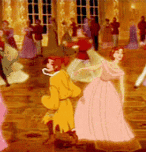 A Group Of People Are Dancing In A Room And One Of Them Is Wearing A Yellow Coat GIF