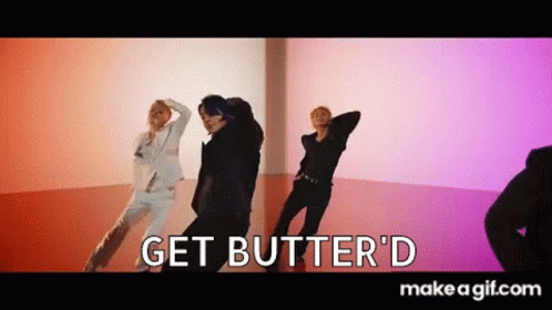 A Group Of People Are Dancing In A Room In A Video . GIF