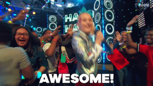 A Group Of People Are Dancing In Front Of A Sign That Says Awesome On It GIF