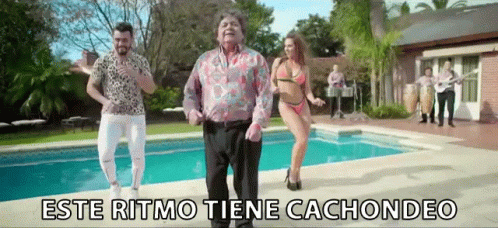 a group of people are dancing in front of a swimming pool with the words este ritmo tiene cachondeo on the bottom