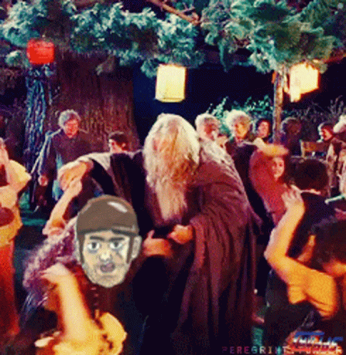 A Group Of People Are Dancing In Front Of A Tree And A Sign That Says ' Peregrine ' On It GIF