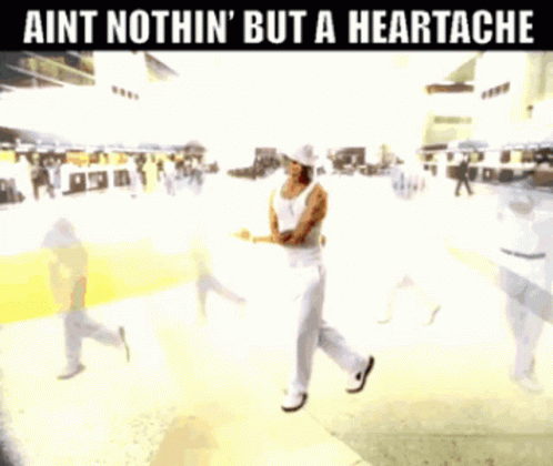 A Group Of People Are Dancing With The Words " Aint Nothin ' But A Heartache " Above Them GIF