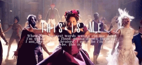 A Group Of People Are Dancing With The Words " This Is Me " GIF