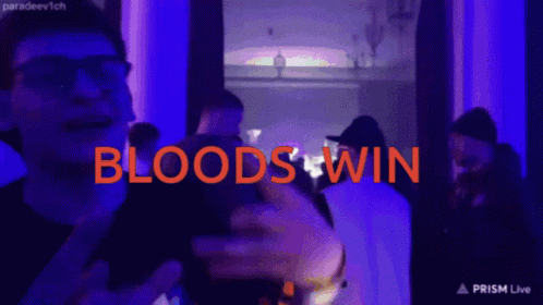 A Group Of People Are Gathered In A Dark Room And The Words Bloods Win Are Displayed GIF