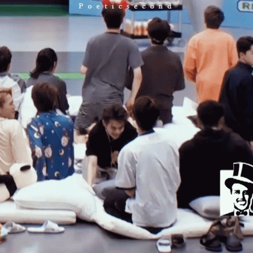 A Group Of People Are Gathered In A Room With The Words Poetic Second On The Bottom Left GIF