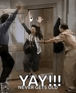 A Group Of People Are Jumping In The Air In Front Of A Door With The Words `` Yay !!! Never Gets Old '' . GIF