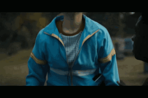 A Group Of People Are Kneeling In Front Of A Grave That Says Roy R Cole GIF