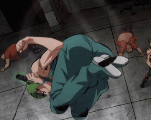 A Group Of People Are Laying On The Ground Including A Man In A Green Hat GIF