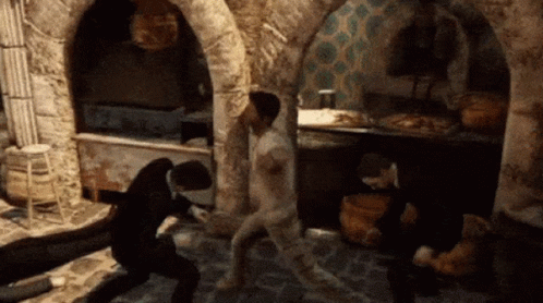 A Group Of People Are Playing A Video Game And One Man Is Naked GIF
