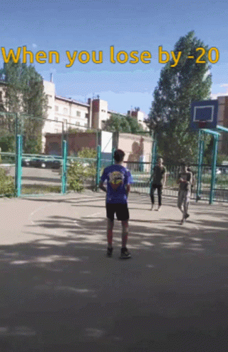 A Group Of People Are Playing Basketball On A Court With The Words When You Lose By -20 GIF