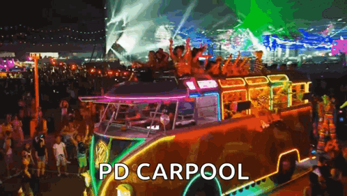 A Group Of People Are Riding On Top Of A Bus At A Festival . GIF