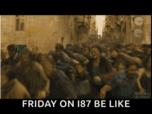 A Group Of People Are Running Down A Street With The Words Friday On 187 Be Like Below Them GIF