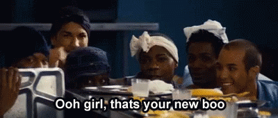 A Group Of People Are Sitting Around A Table And One Of Them Is Saying " Ooh Girl Thats Your New Boo " GIF