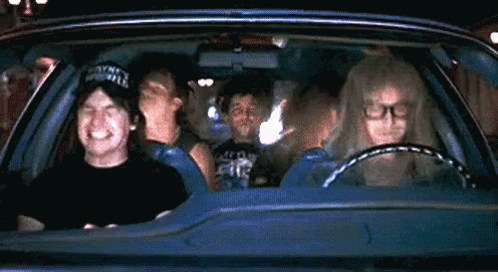 a group of people are sitting in a car with one man wearing a hat that says sydney hill .