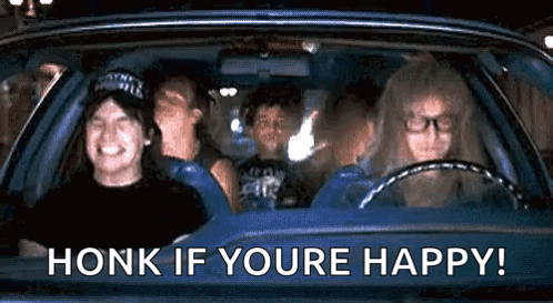 A Group Of People Are Sitting In A Car With The Words `` Honk If You 'Re Happy ! '' GIF