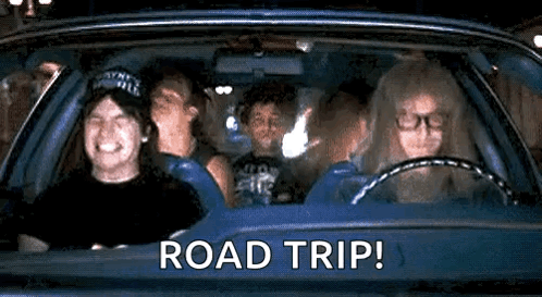 A Group Of People Are Sitting In A Car With The Words `` Road Trip '' Written On The Bottom . GIF