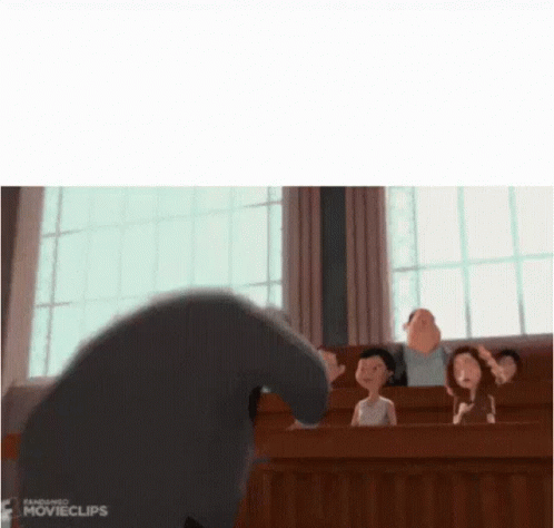 A Group Of People Are Sitting In A Classroom With A Cartoon Character Standing In Front Of Them . GIF