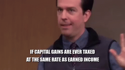 A Group Of People Are Sitting In A Room With A Man In A Purple Shirt And Tie Sitting In Front Of Them . GIF