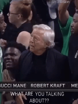 A Group Of People Are Sitting In A Stadium Watching A Basketball Game And One Of Them Is Asking What Are You Talking Abo GIF