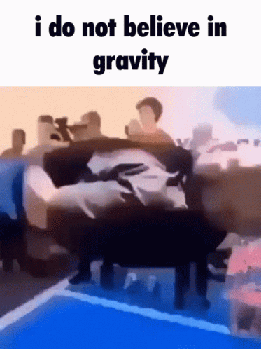A Group Of People Are Standing Around A Pool With The Caption I Do Not Believe In Gravity GIF