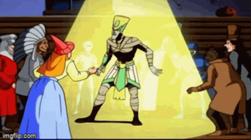 A Group Of People Are Standing Around A Statue Of A Man In A Cartoon . GIF