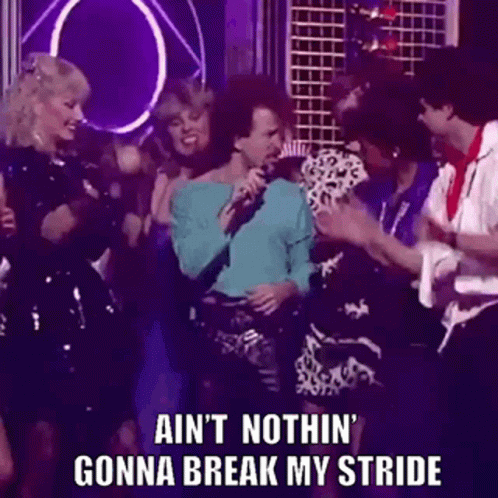 People Around Woman Singing With Microphone GIF